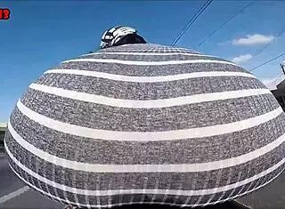 Hot Brunette Rides Motorcycle Showing Ass In Public