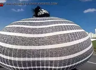 Hot Brunette Rides Motorcycle Showing Ass In Public