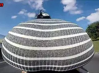 Hot Brunette Rides Motorcycle Showing Ass In Public