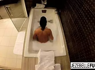 Sexy Jezebelle Bond films herself taking a bath