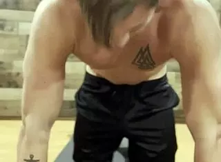 I am stretching my muscular bodybuilder form