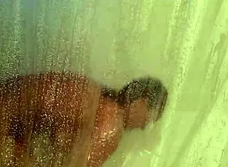 Mandeezy4u2 bathes and masturbates in shower.
