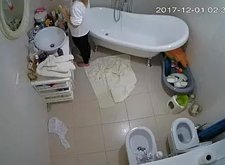 Smart amateurs engage in shaved masturbation under voyeur watch