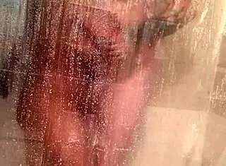 Mandeezy4u2 bathes and masturbates in shower.