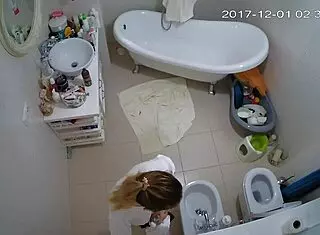 Smart amateurs engage in shaved masturbation under voyeur watch