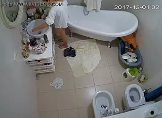 Smart amateurs engage in shaved masturbation under voyeur watch