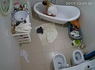 Smart amateurs engage in shaved masturbation under voyeur watch