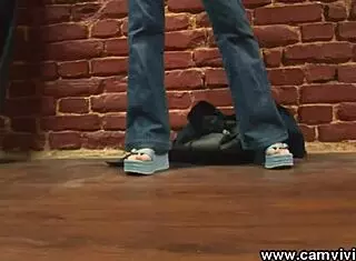 Wearing Denim Jacket And Jeans With Pigtails In Solo Striptease