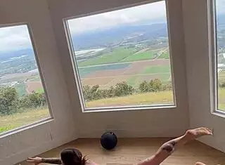 felicity feline doing naked morning yoga with flexible moves and natural tits on display.