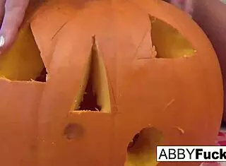 abigail carves a pumpkin then starts playing with her pussy, tits, and ass all alone