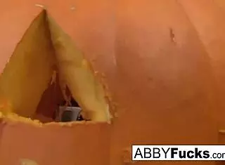 abigail carves a pumpkin then starts playing with her pussy, tits, and ass all alone