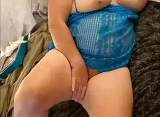 The busty milf strips and sucks a dildo. She masturbates, gets fucked by machine, and takes a facial