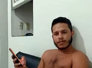 Young well-endowed guy masturbating nicely