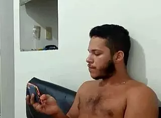 Young well-endowed guy masturbating nicely