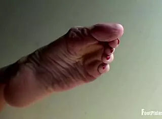 Crystal Enjoys Sensual Footrub with Toe Play