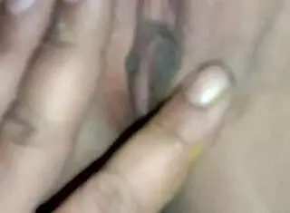 fingering her wet pussy while thinking of big cocks