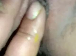 fingering her wet pussy while thinking of big cocks