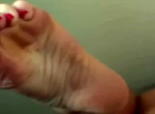 Crystal Enjoys Sensual Footrub with Toe Play