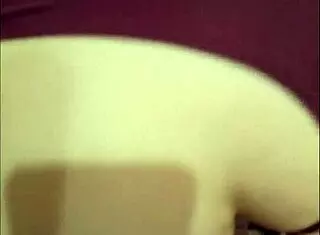 Asian teen bent over in doggystyle.