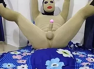 Zentai femdom mistress binds and torments penis in live bdsm session