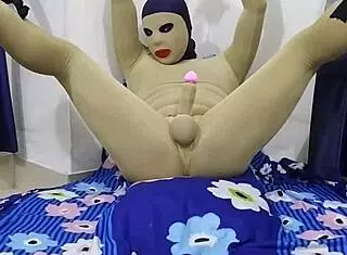 Zentai femdom mistress binds and torments penis in live bdsm session