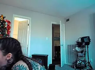 Beautiful alternative girl in bondage costume relaxing