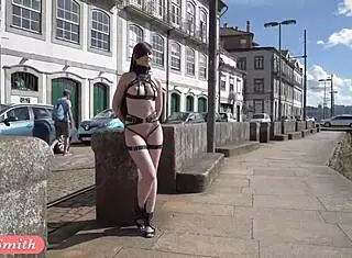Jeny Smith flaunts strap bondage and nude heels in public flashing