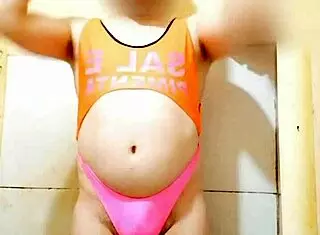 Carolcross shows off her ass in a thong as a sexy latina transsexual