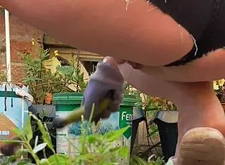 hot new shorts flashing on the balcony patio