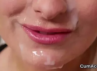 Sexy bombshell receives a facial in a bizarre bukkake scene.