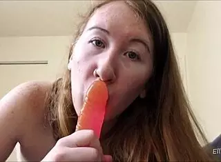 Redhead passionately sucks cock with dildo and toys