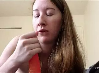 Redhead passionately sucks cock with dildo and toys