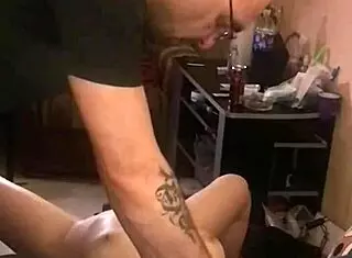 Redhead gets fucked by smoking machine while he smokes, slapped with flogger.