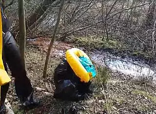 Brutal Femdom in Latex Outdoor with Rich German Mud Play