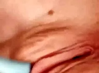 alura marie baker looks horny as she plays with her tits and pussy.