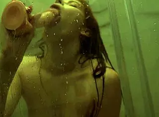Redhead Beauty Junikta Plays With Ass In Shower