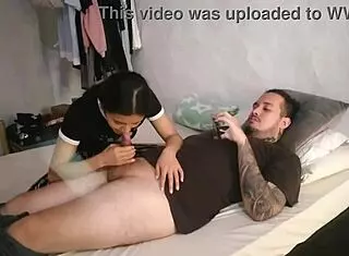 Latina babe with tattoos swallows whole dick while bored at home