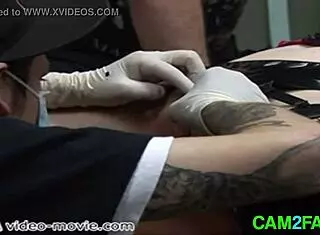 woman gets pussy piercing and body tattoos