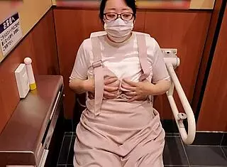 Japanese Wife Masturbates in Store Bathroom Secretly