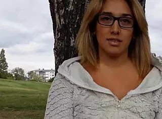 Blonde flashes small tits and shaved pussy outdoors for cash