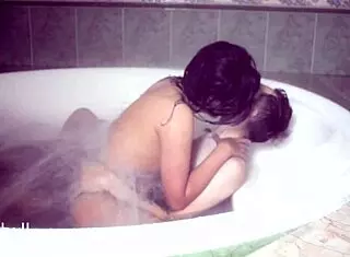 relaxing in the hot bathtub with nude body.