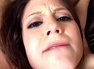 Two cocks keep Kelsey Michaels's mouth and pussy busy during threesome