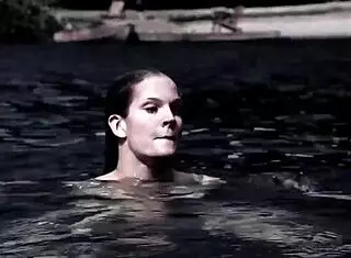 sexy blonde in bikini swimming?