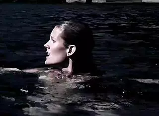 sexy blonde in bikini swimming?