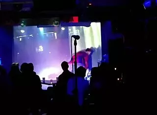 She pumps breast milk publicly for a wild outdoor show. Everyone watches her lactating display.