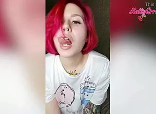 Redhead with butt plug teases her tight pussy solo
