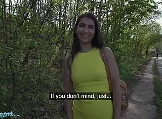 Moona snake bent over in yellow dress