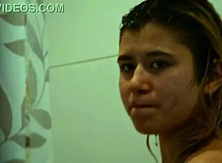 I'm watching my skinny blonde girl bathing in the homemade shower