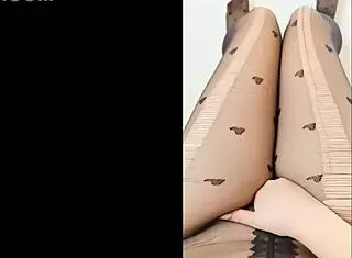 depravedminx reaches orgasm through pantyhose.