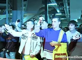 Horny slut spreads legs wide at wild sex show